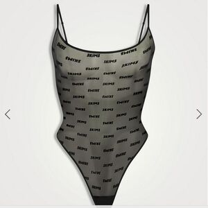 Skims After Hours Sheer Flocked Logo Mesh Bodysuit - onyx